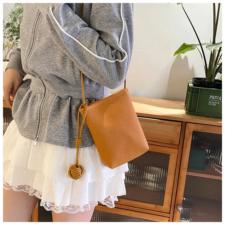 Edie Phone Pouch - alternate view; styling objects excluded