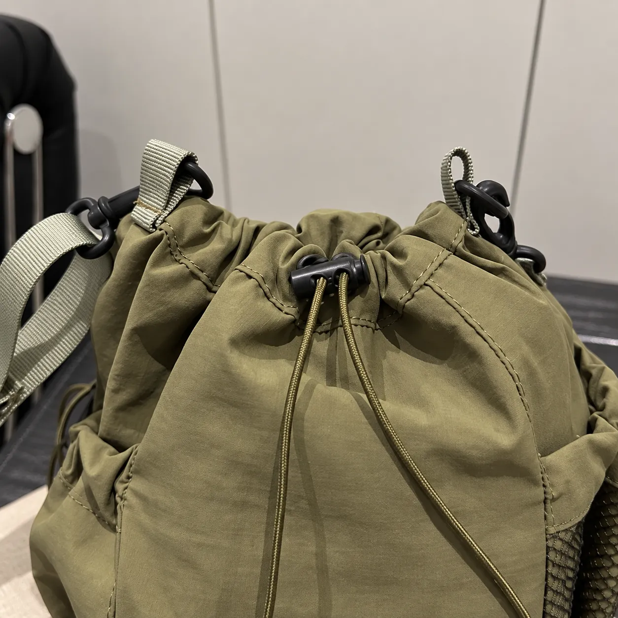 Thea Drawstring Bucket - detail view; styling objects excluded