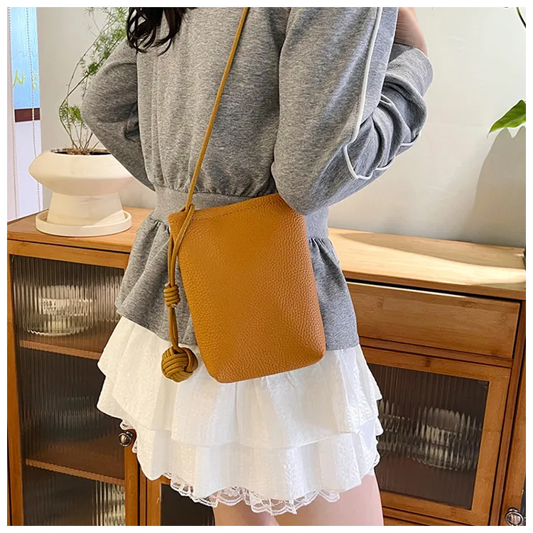 Edie Phone Pouch - use view; styling objects excluded