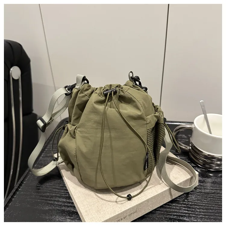 Thea Drawstring Bucket - lead view; styling objects excluded